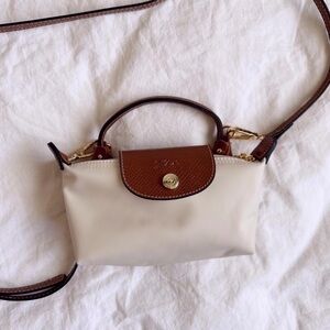 NWT Longchamp Le Pliage Pouch w/ Handle - Paper Beige | Chic, Compact Style